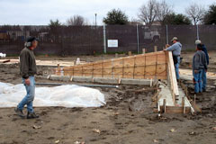 The artist Sam Tubiolo supervising construction at the Evidence of Life site at Mace Park in Davis, CA. 