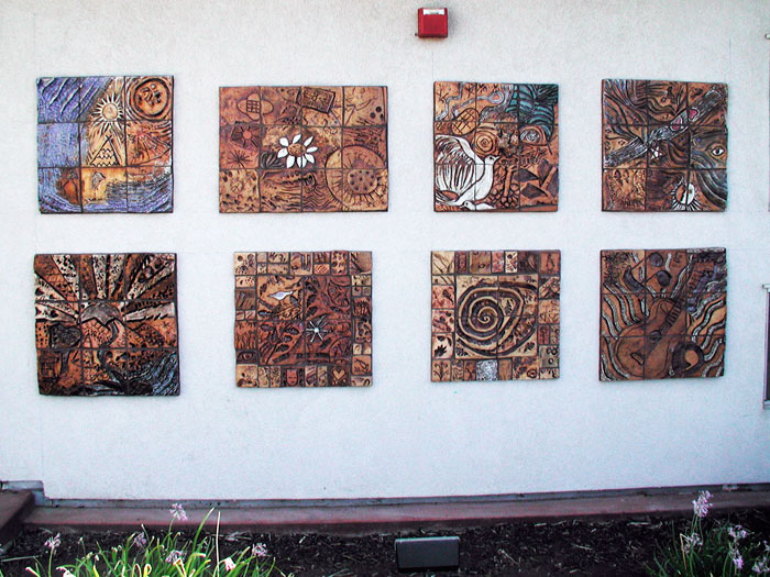 Eight ceramic handmade tiles by artist Sam Tubiolo and residents at the Safe Harbor Crisis House in Woodland, CA.