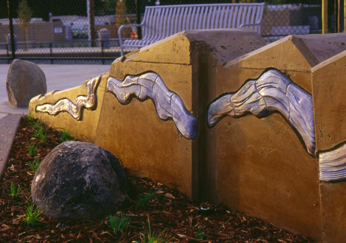 Detailed view of tile wall by artist Sam Tubiolo at Sacramento's Hazel Light Rail statioin.